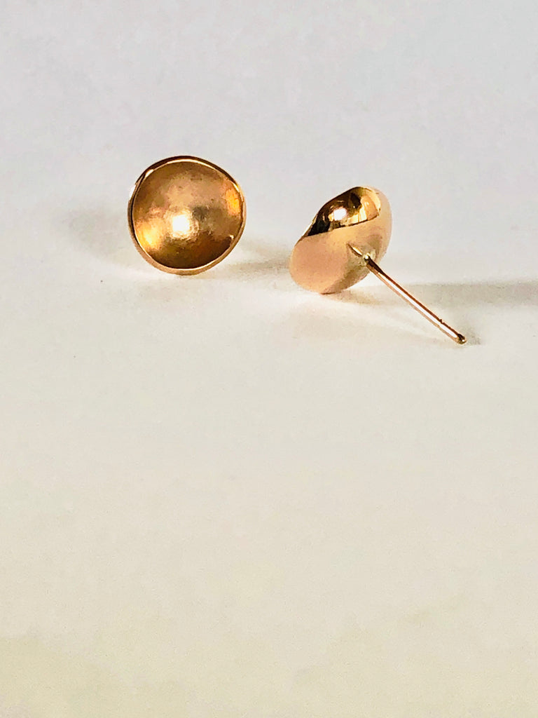 close up of 24k gold handmade domed stud earrings